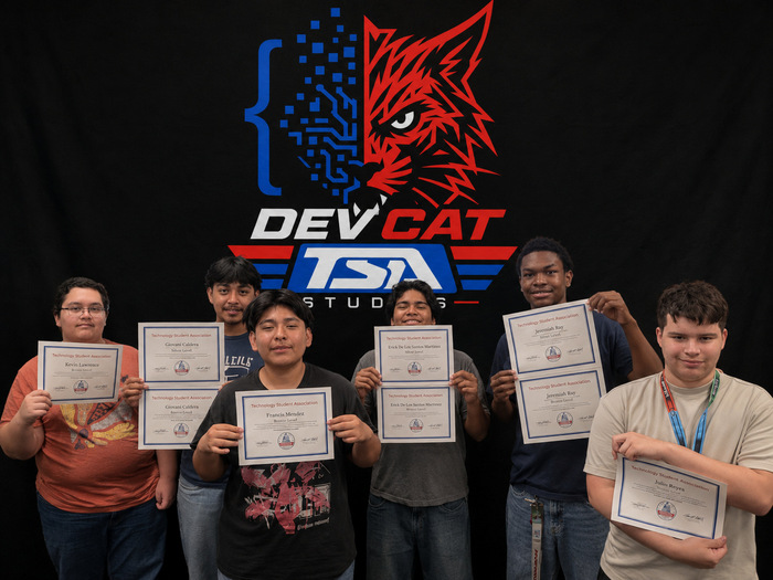 LVHS TSA students holding Bronze and Silver Achievement Program certificates